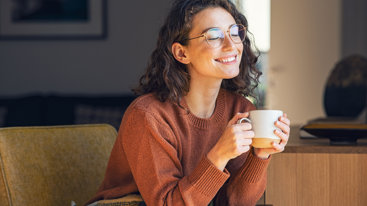 lady_being_happy_with_a_cup_of_coffee